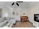 Open-concept living room featuring hardwood floors, plenty of space, and natural light at 3202 Monarch Pine Dr, Peachtree Corners, GA 30071