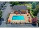 Aerial view of the community pool and the surrounding community at 506 Summer Pl, Norcross, GA 30071