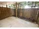 A private fenced-in back patio offers a serene outdoor space at 506 Summer Pl, Norcross, GA 30071