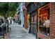 Charming storefront with brick facade and inviting display window along a tree-lined street at 506 Summer Pl, Norcross, GA 30071