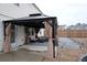 Relaxing backyard featuring a charming gazebo and elegant stone patio seating area at 1603 Maston Rd, Auburn, GA 30011