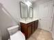 Bathroom featuring double sink vanity, modern mirrors, and convenient toilet with bidet at 1603 Maston Rd, Auburn, GA 30011