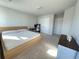 Bedroom featuring neutral walls, double closets and a large window for natural light at 1603 Maston Rd, Auburn, GA 30011