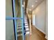 Welcoming foyer featuring hardwood floors, staircase, and natural light at 169 Ward