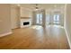 Bright living room with hardwood floors, a fireplace and modern finishes at 169 Ward