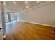 The living room offers hardwood floors and an open space with natural light at 169 Ward