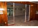 Open floor plan showcasing the living room, viewed from the wood-paneled kitchen at 3204 Spreading Oak Sw Dr, Atlanta, GA 30311