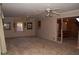 Spacious living room leading to the wood-paneled kitchen at 3204 Spreading Oak Sw Dr, Atlanta, GA 30311