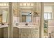 Bathroom features large vanity and pink vintage-inspired tiling at 4031 Pine Needle Dr, Duluth, GA 30096