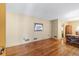 Cozy living room featuring hardwood floors, neutral walls, and ample natural light at 4031 Pine Needle Dr, Duluth, GA 30096