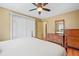 Bedroom with wood floors, traditional furnishings, and natural lighting at 4031 Pine Needle Dr, Duluth, GA 30096