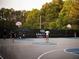 Outdoor basketball court in recreational area providing space for sports and community activities at 606 Goldsmith Ct # 114, Johns Creek, GA 30022