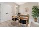 Cozy home office featuring a modern desk and chair set, window, and neutral walls at 1548 Burberry Aly, Marietta, GA 30008