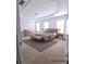 Comfortable, staged main bedroom with a well-placed bed and neutral decor at 2823 Mount Wilkinson Se Pkwy # 14, Atlanta, GA 30339
