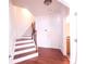 Beautiful staircase with wood floors and white painted risers and banisters at 2823 Mount Wilkinson Se Pkwy # 14, Atlanta, GA 30339