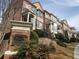 Beautiful brick townhomes at Vinings Overlook with landscaped grounds and well-maintained exteriors at 2823 Mount Wilkinson Se Pkwy # 14, Atlanta, GA 30339