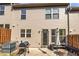 Backyard patio with grill, bench, and outdoor umbrella at 5008 Whiteoak Pointe Se # 15, Smyrna, GA 30080