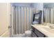 Bathroom featuring a shower, a storage ladder, and neutral color scheme at 5008 Whiteoak Pointe Se # 15, Smyrna, GA 30080