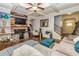 Cozy living room with hardwood floors, fireplace, and comfortable seating arrangement at 5008 Whiteoak Pointe Se # 15, Smyrna, GA 30080