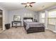 Bright main bedroom featuring carpet flooring, and stylish decor at 5008 Whiteoak Pointe Se # 15, Smyrna, GA 30080