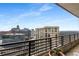 Spacious balcony boasting of skyline views and a black steel railing at 750 Park Ne Ave # 25W, Atlanta, GA 30326
