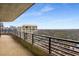 Spacious balcony boasting of neighborhood views and a black steel railing at 750 Park Ne Ave # 25W, Atlanta, GA 30326