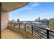 Spacious balcony boasting of city views and a black steel railing at 750 Park Ne Ave # 25W, Atlanta, GA 30326