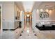 Stately hallway with marble floors, recessed lighting, and refined decor leading to a comfortable lounge area at 750 Park Ne Ave # 25W, Atlanta, GA 30326