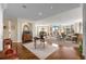 Spacious living room featuring hardwood and carpeted floors, natural light, and stylish furniture at 750 Park Ne Ave # 25W, Atlanta, GA 30326