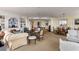 Spacious living and dining area with built-in shelving and ample seating at 750 Park Ne Ave # 25W, Atlanta, GA 30326