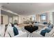 Open-concept living room featuring stylish seating, hardwood floors, and natural light at 750 Park Ne Ave # 25W, Atlanta, GA 30326