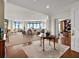 Bright and airy living room with hardwood floors, large windows, and ample seating at 750 Park Ne Ave # 25W, Atlanta, GA 30326