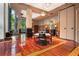 Lobby area with large windows, shiny wood floors, decorative ceilings, and multiple seating areas at 750 Park Ne Ave # 25W, Atlanta, GA 30326