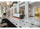 Grand lobby showcasing marble floors, stylish decor, and a welcoming reception desk near elevator access at 750 Park Ne Ave # 25W, Atlanta, GA 30326