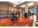 Spacious lobby area with shiny wood floors, decorative ceilings, and multiple seating areas at 750 Park Ne Ave # 25W, Atlanta, GA 30326