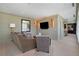 Comfortable lounge area with couch, chair, and tv at 750 Park Ne Ave # 25W, Atlanta, GA 30326