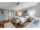 Elegant main bedroom featuring large windows, hardwood floors, and ample seating at 750 Park Ne Ave # 25W, Atlanta, GA 30326