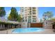 Refreshing pool with sundeck, lounge chairs, and a pergola at 750 Park Ne Ave # 25W, Atlanta, GA 30326