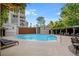 Inviting pool area surrounded by lush foliage and comfortable lounge chairs at 750 Park Ne Ave # 25W, Atlanta, GA 30326
