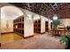 Unique wine cellar featuring custom storage, brick floors, and cozy seating for tasting and enjoyment at 750 Park Ne Ave # 25W, Atlanta, GA 30326