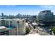 Expansive aerial view of city skyline, showcasing nearby buildings, and vibrant urban surroundings at 1100 Howell Mill Nw Rd # 708, Atlanta, GA 30318