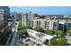 Modern apartments, restaurants, and retail spaces surrounded by trees, streets, and parking at 1100 Howell Mill Nw Rd # 708, Atlanta, GA 30318