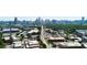 Panoramic aerial view showcasing the city skyline with lush green trees, buildings, and street views at 1100 Howell Mill Nw Rd # 708, Atlanta, GA 30318