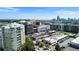 A vibrant aerial view of the city skyline and surrounding buildings, showcasing a dynamic urban landscape at 1100 Howell Mill Nw Rd # 708, Atlanta, GA 30318