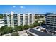 Modern apartment building with balconies, views of the surrounding neighborhood, and ample parking spaces at 1100 Howell Mill Nw Rd # 708, Atlanta, GA 30318
