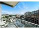 Enjoy city views from this condo's balcony with glass railings and comfortable seating at 1100 Howell Mill Nw Rd # 708, Atlanta, GA 30318