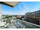 Balcony with glass railing and city views on a sunny day at 1100 Howell Mill Nw Rd # 708, Atlanta, GA 30318