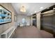 Elegant elevator lobby with decorative walls, seating area, and modern lighting at 1100 Howell Mill Nw Rd # 708, Atlanta, GA 30318