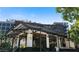 Shake Shack restaurant featuring an inviting open-air design, lit signage, and outdoor seating at 1100 Howell Mill Nw Rd # 708, Atlanta, GA 30318