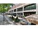 The Ormsby restaurant and Free People store with outdoor seating area in a brick building at 1100 Howell Mill Nw Rd # 708, Atlanta, GA 30318